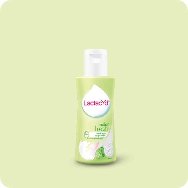 A green bottle of Lactacyd Odor Fresh.